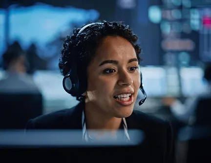 Sales counsellor on a call at their desk